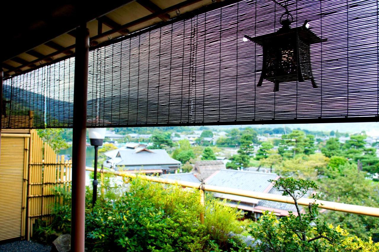 Kyoto Arashiyama Onsen Ryokan Togetsutei Екстер'єр фото