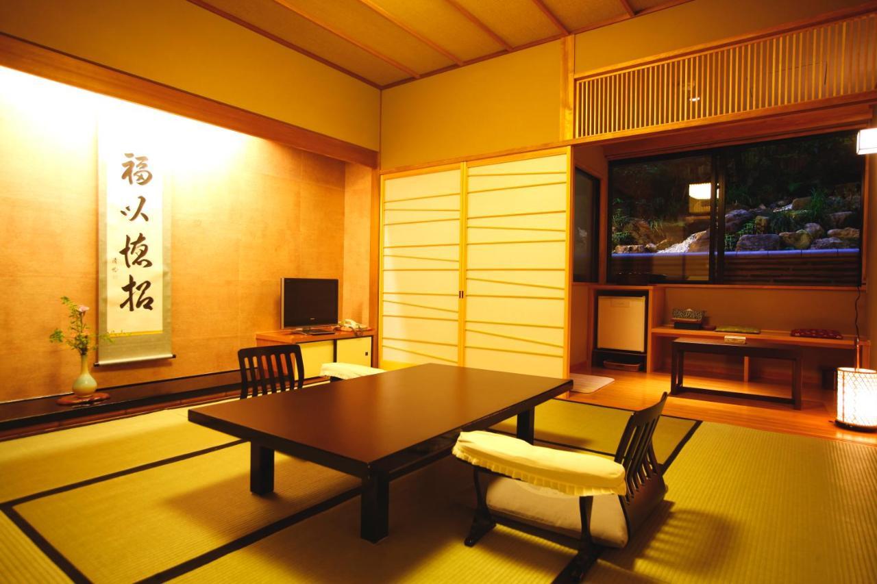 Kyoto Arashiyama Onsen Ryokan Togetsutei Екстер'єр фото