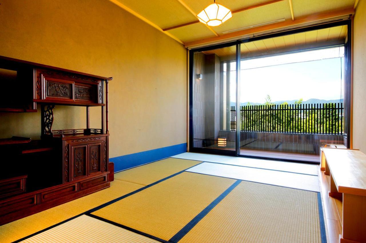 Kyoto Arashiyama Onsen Ryokan Togetsutei Екстер'єр фото